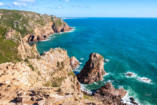 Cabo da Roca, Portugal near Sintra, Lisbon district. Dramatic cliffs in Atlantic ocean. Most western point of Europe. Beautiful seascape with rugged coast