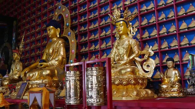 The interior of one of the many Buddhist temples in Mongolia. Bronze figures of deities and saints.