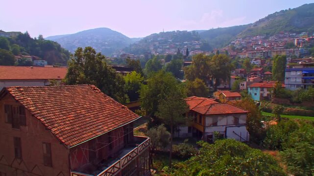 Traditional Ottoman Houses Sprawling at the Foot of a Lush Green Mountain in Bursa