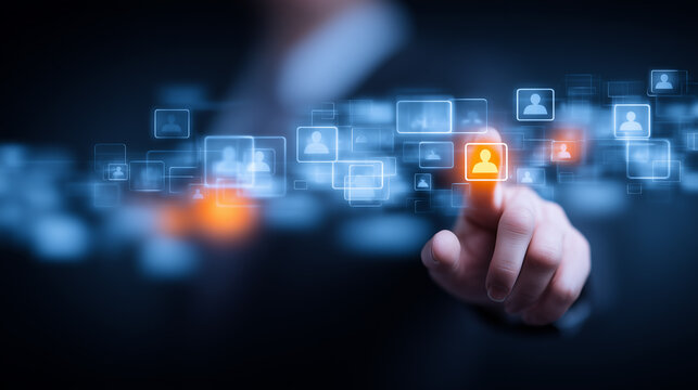 Hand selecting a highlighted user icon on a digital interface illustrating customer targeting, recruitment strategy, and modern identity management.
