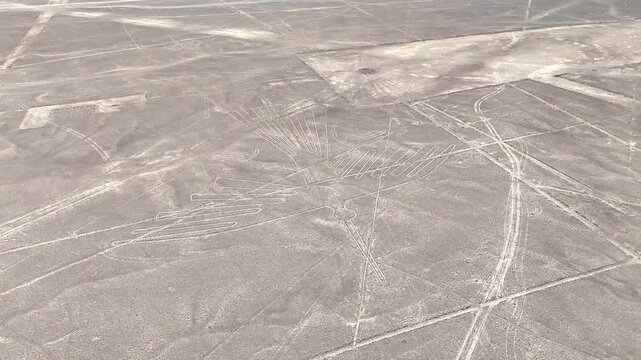 Panoramic view of the ancient Nazca Lines in the Peruvian desert. UNESCO World Heritage archaeological site and geoglyphs.