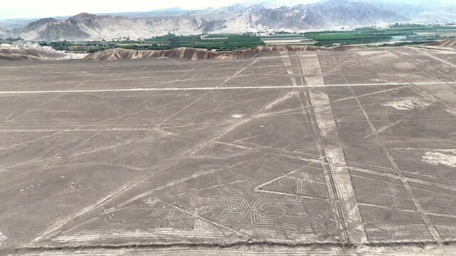 Panoramic view of the ancient Nazca Lines in the Peruvian desert. UNESCO World Heritage archaeological site and geoglyphs.