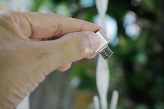 wedding rings in hand