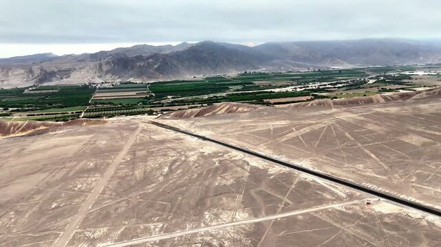 Panoramic view of the ancient Nazca Lines in the Peruvian desert. UNESCO World Heritage archaeological site and geoglyphs.