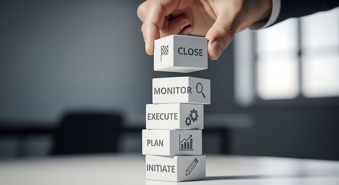 Hand stacking blocks representing project management phases: Initiate, Plan, Execute, Monitor, and Close.