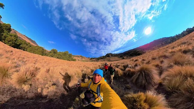 Hiker taking a selfie while walking up iztaccihuatl volcano