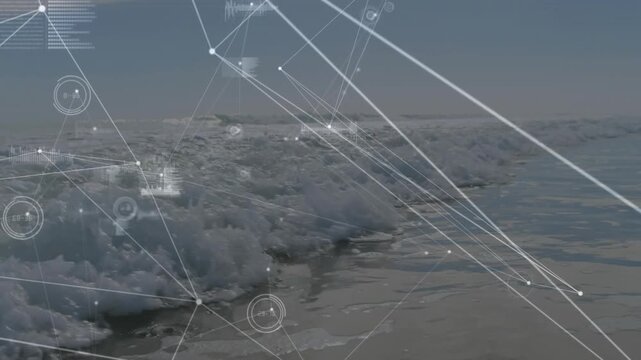 Moving ocean surface revealing breaking waves and foam at near-shore, with nodes gauges readouts