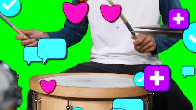 Drummer playing snare with sticks on green chroma icons appearing at edges moving inward for music