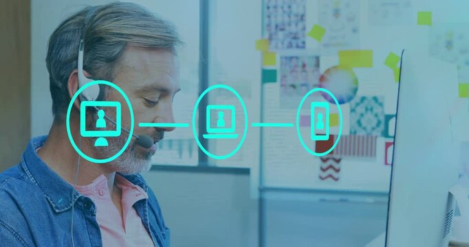 Man speaking into headset at desk pc icon appearing and starting teal support icons overlaying
