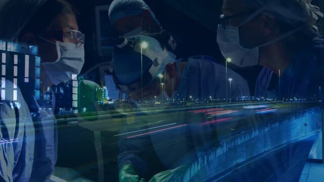 Camera shifting overlay surgical team operating to treat patient lamp tools city lights sweeping