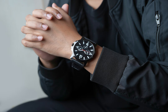 Close Up of Man Wearing Black Chronograph Watch on Wrist, Modern Minimal Style