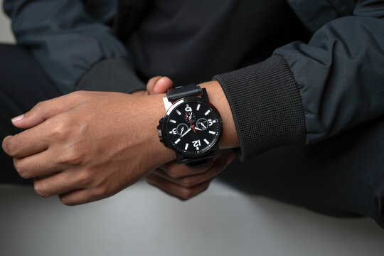 Close Up of Man Wearing Black Chronograph Watch on Wrist, Modern Minimal Style