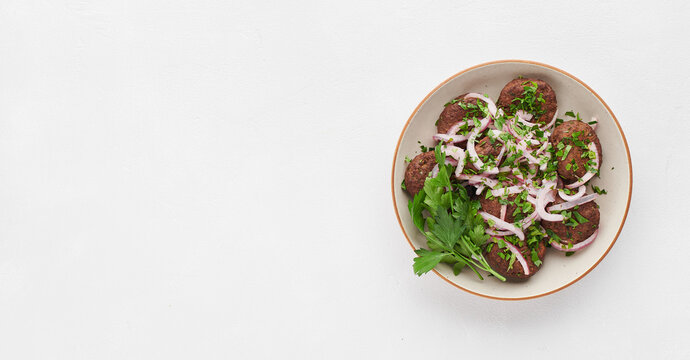 Top view of traditional Turkish kofte meatballs, top view, copy space