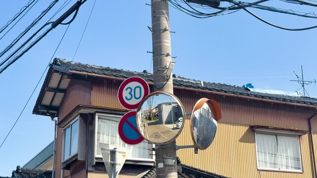 Convex Traffic Mirrors and Power Lines in a Kanazawa Neighborhood