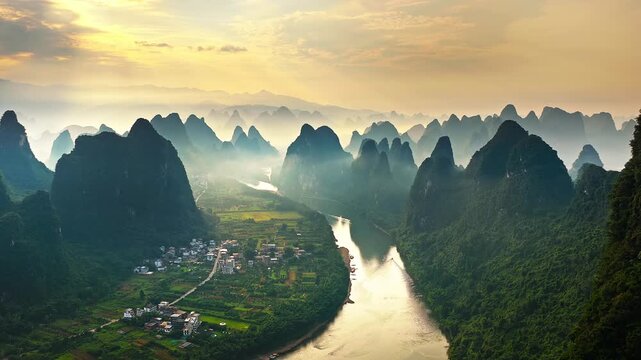 Spectacular aerial view of the Li River winding through dramatic karst mountains at sunrise in Guilin, China