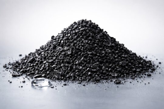 Granular Activated Carbon Heap for Water Purification on Plain Background