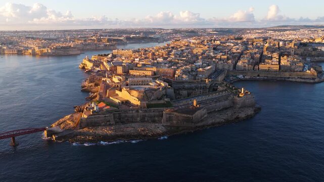 Fort Saint Elmo At The Tip Of The Sciberras Peninsula In Valletta, Malta At Sunrise. Aerial Drone Shot