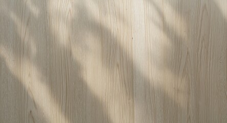 Obraz premium Natural light wood grain background featuring subtle shadows and copy space