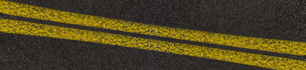 Fototapeta premium Lignes jaunes sur asphalte 