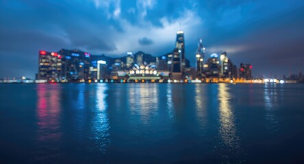 Naklejka premium Urban skyline blurred by electric blue sky reflections and atmospheric effects on water