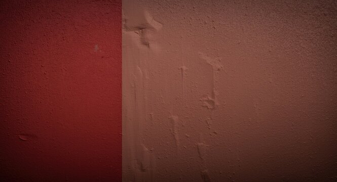 Segment of wall showcasing half painted reddish brown surface