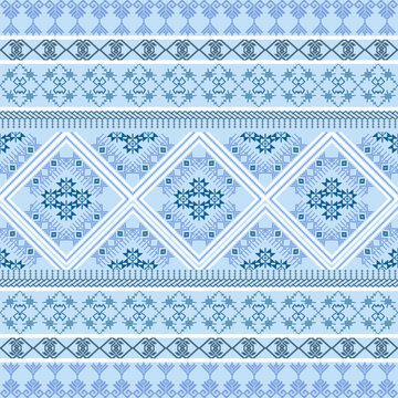 Blue and white knitted ethnic boho seamless pattern. Patchwork texture. Weaving. Pixel vector pattern. Cross-stitch vector seamless pattern. Wallpaper, textiles, and elaborate borders.