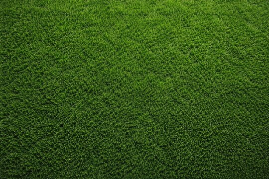 Lush green turf grass texture background with vibrant artificial grass surface