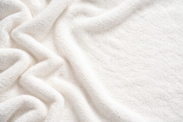 Fototapeta premium Soft white plush towel fabric background with gentle shadow and copy space