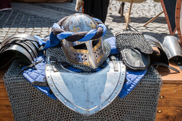 Naklejka premium Renaissance festival medieval time fair with colorful banners and lively market scene and engaging in crafts, Sibiu, Romania