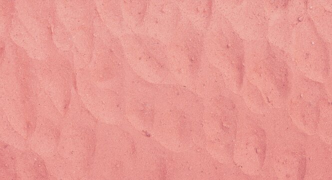 Vintage pink sand texture background with soft coral hues for trendy photography