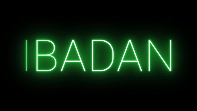 Flickering neon green glowing ibadan sign animated on black background