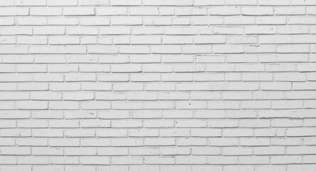 Fototapeta premium White brick wall background featuring blank copy space for template