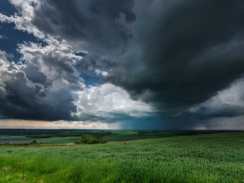pre-storm sky with green tinted clouds, heavy low hanging storm clouds