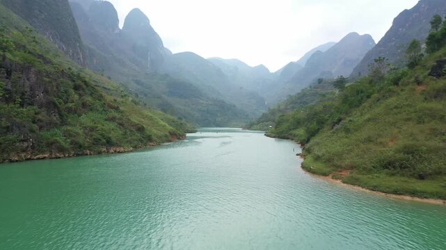 Aerial view of Nho Que River flowing through deep Tu San Canyon in Ha Giang