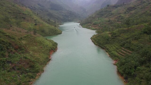 Aerial view of Nho Que River flowing through deep Tu San Canyon in Ha Giang
