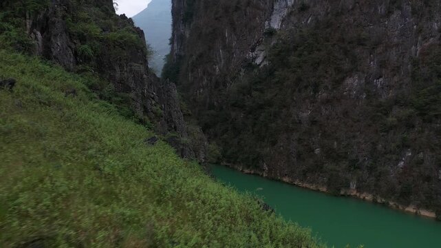 Aerial view of Nho Que River flowing through deep Tu San Canyon in Ha Giang