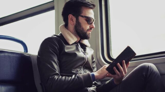 Freelancer Checking Data On Mobile Device Commute. Remote Work On The Go