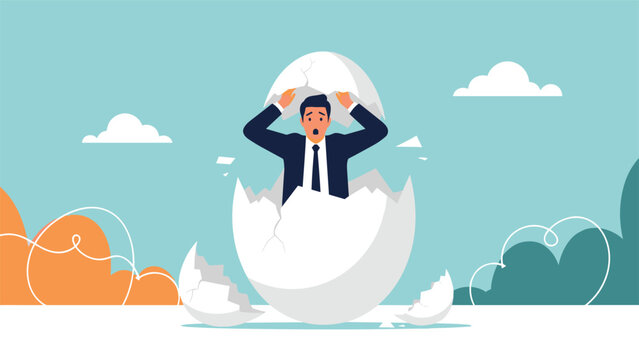 Surprised businessman hatching out of a large cracked white egg shell representing a new beginning or birth of a career.