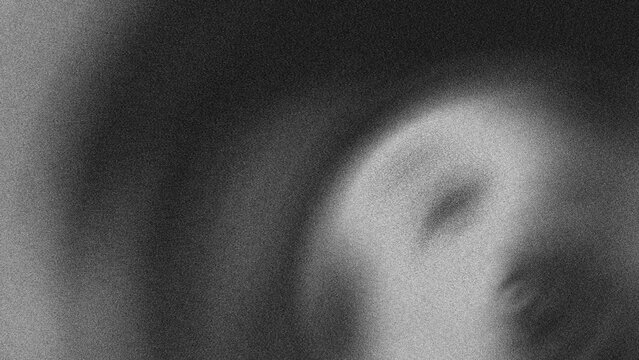 Abstract background with radial motion blur effect in black and white with high contrast with grainy noise effect.