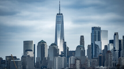 Fototapeta premium Manhattan skyscrapers in warm sunlight in New York. Manhattan skyline above Hudson in New York. Manhattan city skyline panorama in New York. Manhattan American city with famous skyscrapers.