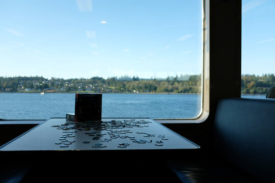 A community puzzle on a ferry overlooking the Puget Sound