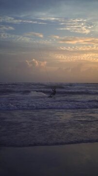 Kitesurfer Silhouette at Golden Sunset on Canggu Beach Bali Ocean