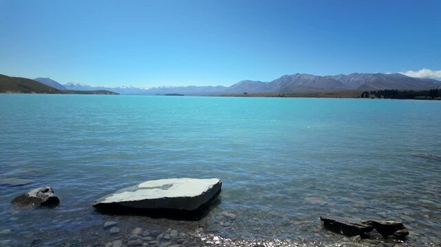 Rocky Shore On Turquoise Lake