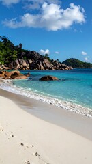 Obraz premium A serene beach scene with turquoise water and white sand