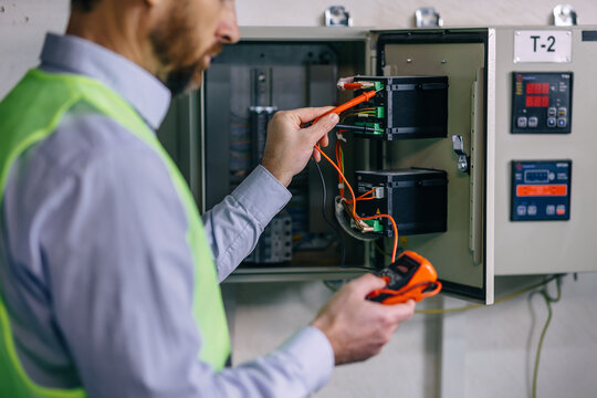 checking voltage control panel screen system at electrical cabinet for generate electricity of factory in manufacture industrial