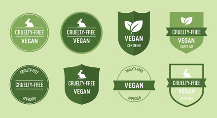 A collection of eight circular and shield shaped cruelty free and vegan certification badges in varying shades of green high quality professional detailed