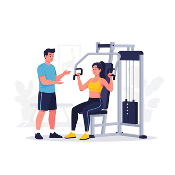 Woman working out on chest press machine with personal trainer