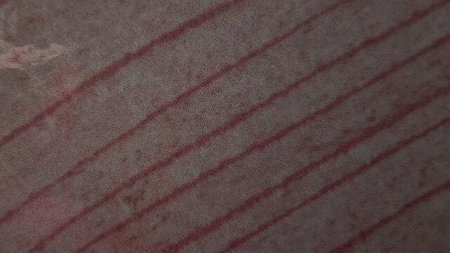 4K Macro Texture of Pink Ceramic Tile with Parallel Lines Pattern