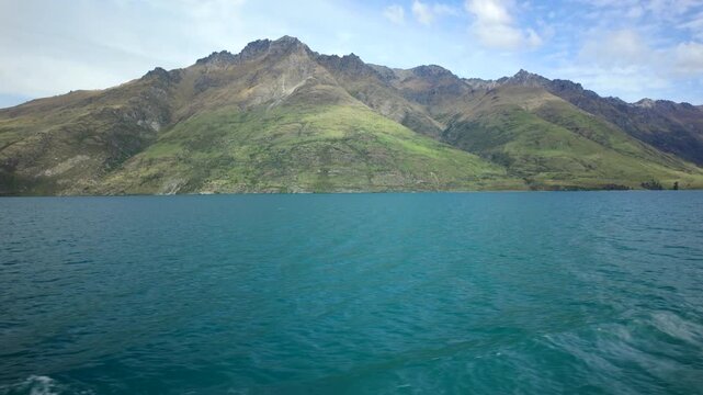 Mountain Shore Across Blue Lake