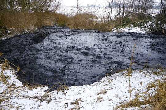 Mudslide in winter on a meadow
